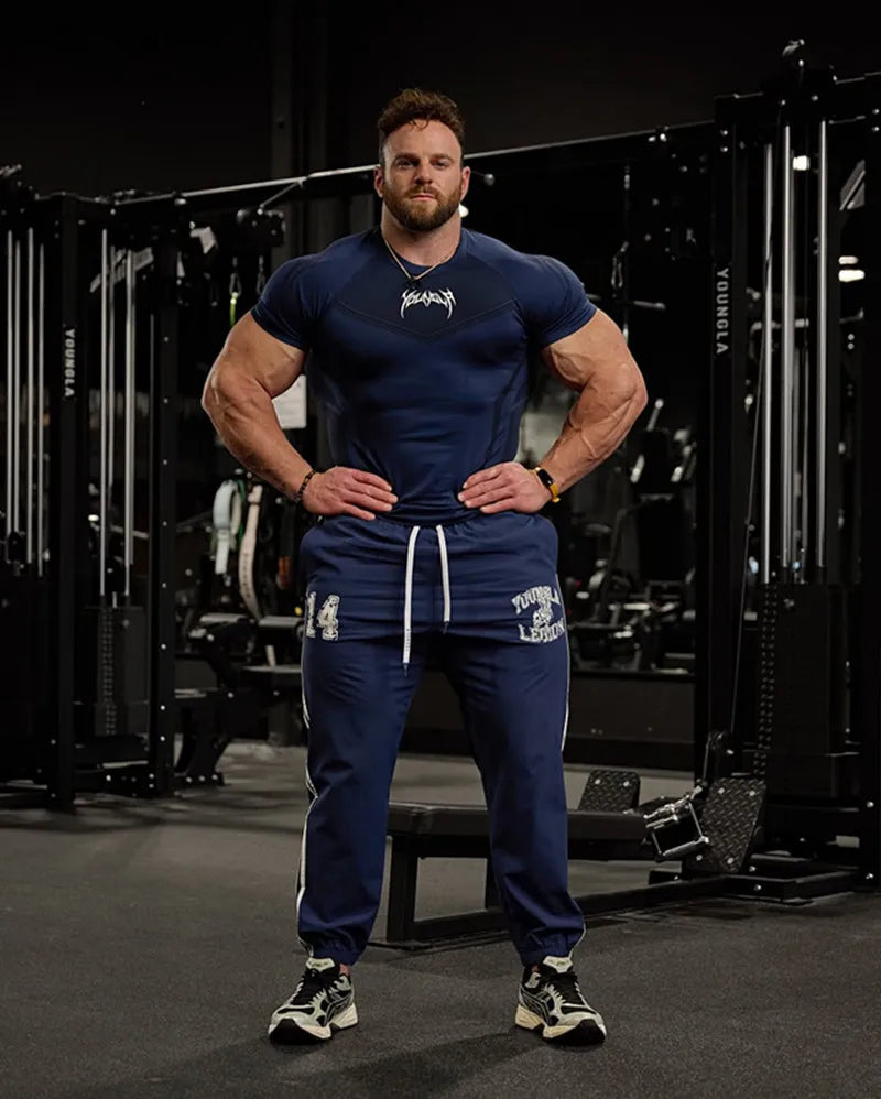 Camiseta masculina de manga curta – modelo 2025 para primavera e outono, estilo fitness, de secagem rápida, respirável, elástica e com ajuste justo ao corpo.