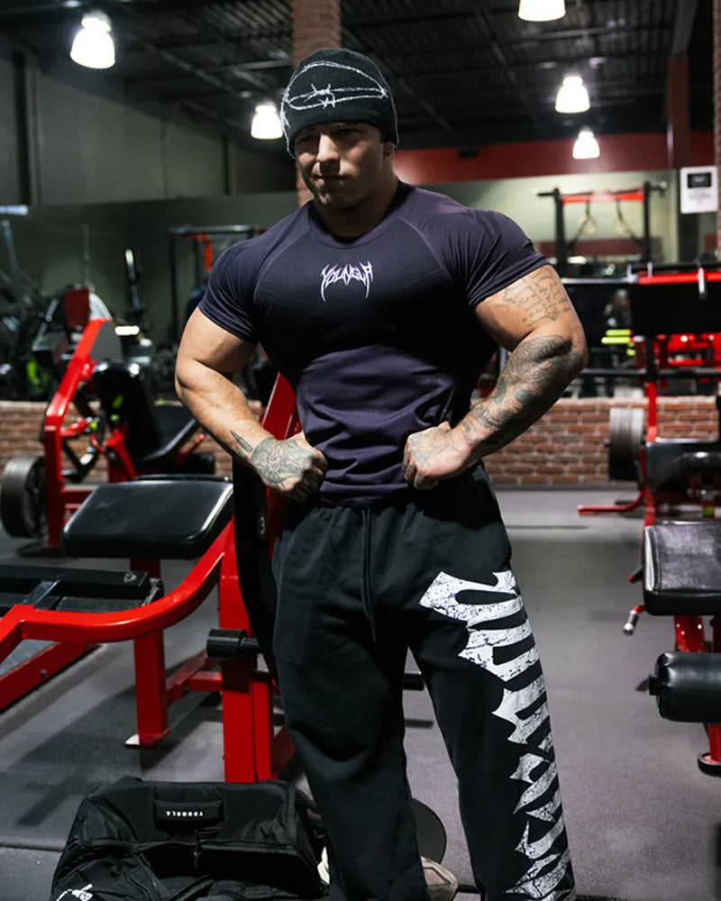 Camiseta masculina de manga curta – modelo 2025 para primavera e outono, estilo fitness, de secagem rápida, respirável, elástica e com ajuste justo ao corpo.